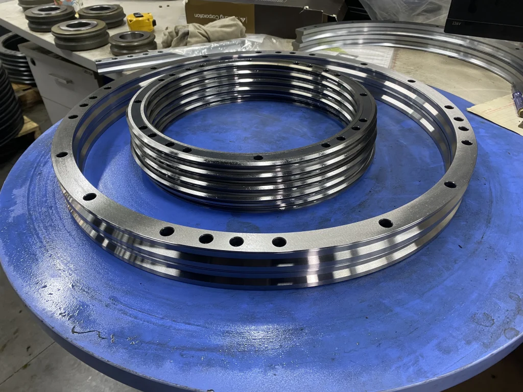 Close view of circular rail working faces and perimeter mounting holes